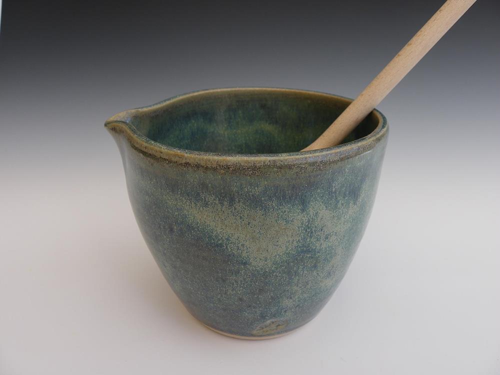 Small mixing bowl.
On Etsy for sale
Wooden spoon provided.