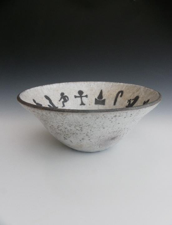 Raku-fired pot.
Hieroglyphic images inspired by life.